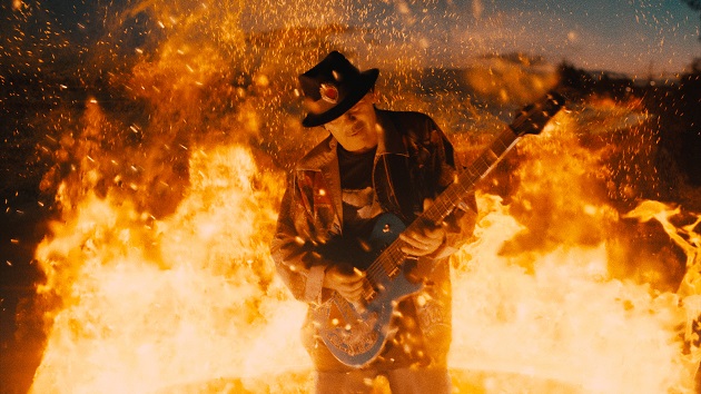 Watch incendiary video for “She's Fire,” Santana's new collaboration with Diane Warren, G-Eazy